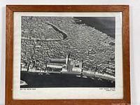 Full view of the framed aerial photograph showing Saint Marks Square and surrounding Venice in black and white, with visible frame edges.