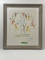Full view of framed lithograph against white background