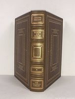 Full view of the leather bound book Good as Gold by Joseph Heller showing full spine detail with gold embossing and gilding.