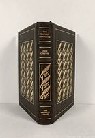 Front and back cover with gold leaf design and spine title