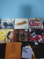 Photo showing 8 CD albums including Chicago, La Oreja de Van Gogh, and a speeches CD.