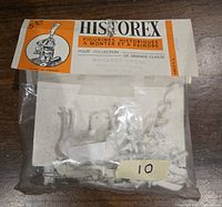 Photo showing sealed plastic bag packaging with multiple unpainted plastic kit parts inside, labeled Historex Baggage Train Ambulance service 54mm
