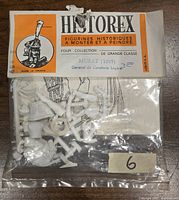 Original sealed packaging of Historex plastic miniature kit for Général de Cavalerie Légère 1809 with unassembled figure parts in white plastic.