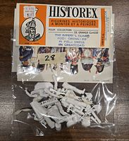 Plastic miniature parts in original packaging with product label showing Historex Imperial Guard Foot Grenadier kit in 54mm scale, unpainted and unopened bag of pieces.