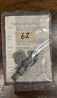 Photo of sealed Rose military miniature showing metal Grenadier parts and printed insert describing the item