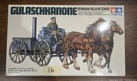 Closed box showing box art of German field kitchen wagon with horses and soldier figure, Tamiya branding visible