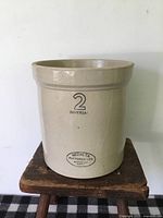 Front view of beige ceramic crock showing '2 Imperial' marking and Medalta Potteries stamp.