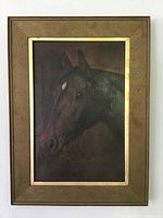 Front view of the framed antique horse painting on board showing the horse's head and wooden frame.