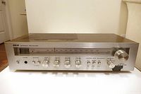 Front view showing full control panel and tuner display