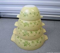 All four Pyrex Shenandoah bowls stacked largest to smallest showing exterior pattern