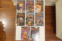 All eight Street Fighter II comics laid out to show fronts