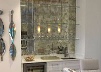 Staged installation example of similar antique mirror tiles