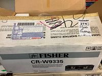 Box labeled Fisher CR-W9335 double auto reverse stereo cassette deck with shipping label and markings.