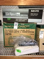 Photo showing Sanyo MW-805(H) cassette recorder box with indication of double cassette recorder, high-speed dubbing, full auto stop, and Magnasonic TV radio box.