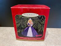 Original red Hallmark Keepsake Ornament box with image of Barbie Millennium Princess ornament on front.