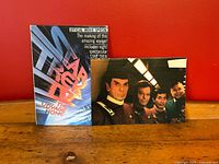 Front cover view of the Star Trek IV Official Movie Special softcover book and one folded poster showing main cast members