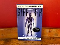 Front cover of the paperback book 'The Physics of Star Trek' by Lawrence M. Krauss