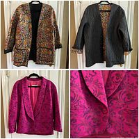 Reversible quilted floral jacket shown front and reverse sides highlighting black quilted texture and vibrant floral pattern with binding trim and pockets.
