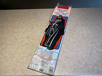Photo of original packaging showing kite in sealed bag with label and Darth Vader graphic on front.