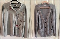 Both cardigans displayed hanging side by side: Classic Editions fleece cardigan with embroidery on left, Frank And Oak ribbed button-up cardigan on right