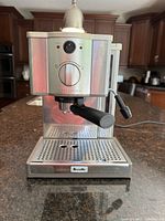 Front view of Breville Café Roma espresso machine showing dial control and portafilter