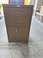 Front view of the 2 drawer filing cabinet showing drawer handles and label holders.
