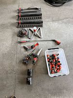 Multiple irrigation fittings, three oscillating sprinklers, triangular and disc sprinklers, spray lance, spray gun