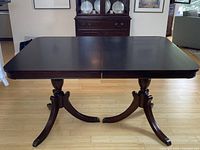 Front view of table with both leaves attached