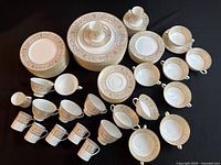 Full set of all pieces arranged on black background