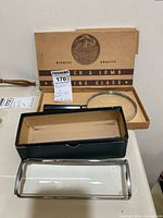 Bausch and Lomb vintage rectangular magnifying glass with original box and black inner case.