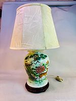 Full view of ginger jar lamp with fabric shade and wooden base, showing the overall appearance and size.