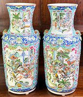 Front view of both vases showing overall decoration and silhouette