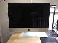 Front view of 21.5-inch iMac showing aluminum bezel and display