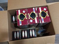 Box containing multiple boxed Starting Lineup Cooperstown Collection baseball figures.