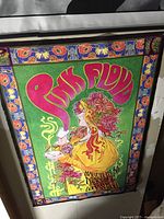 Framed colorful psychedelic Pink Floyd concert poster with floral woman and 'Marcellus M' 1966 text