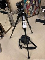 Full view of Manfrotto tripod set up with Lowepro bag at base