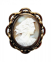 Front view showing carved shell cameo and gold-filled frame