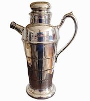 Full front view of Viking silver-plate cocktail shaker showing handle and spout