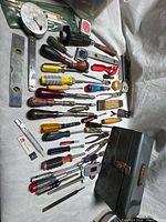 All tools and toolbox laid out showing quantity and condition