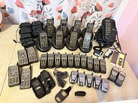 Full layout of Motorola and Nextel phones, chargers, batteries, holsters, and manuals
