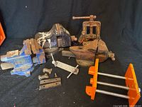 Group of vises and parts