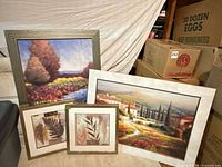 Group shot of all four prints showing frames and matting