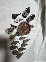 group shot showing all pulleys, casters and roller brackets
