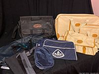 Group shot of all seven United travel bags and pouches