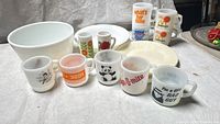 Group shot showing all mugs, bowl, tumblers and plates