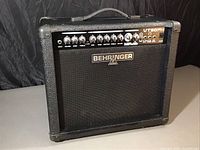 Black Behringer VT30FX amplifier front angle showing control panel and Behringer logo