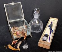 All items in the lot shown together including perfume bottle, trinket box with jewelry, and Venetian glass pen in box with ink bottle