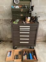 Full view of Kennedy rolling chest, S-K toolbox on top and three tool trays on floor