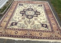 Full view of entire rug laid flat outdoors showing overall design and dimensions