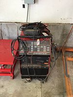 Front view of control panel, cables draped over unit